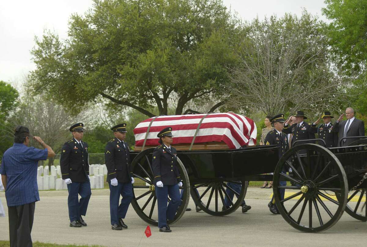 The caisson bearing the body of Col. Robert B. Tully makes its way through Fort Sam Houston National Cemetery on Tuesday, March, 7, 2017. Col. Tully, who died on February 16, served in Vietnam during the Battle of Ia Drang, the first major battle for U.S. ground forces in that war.
