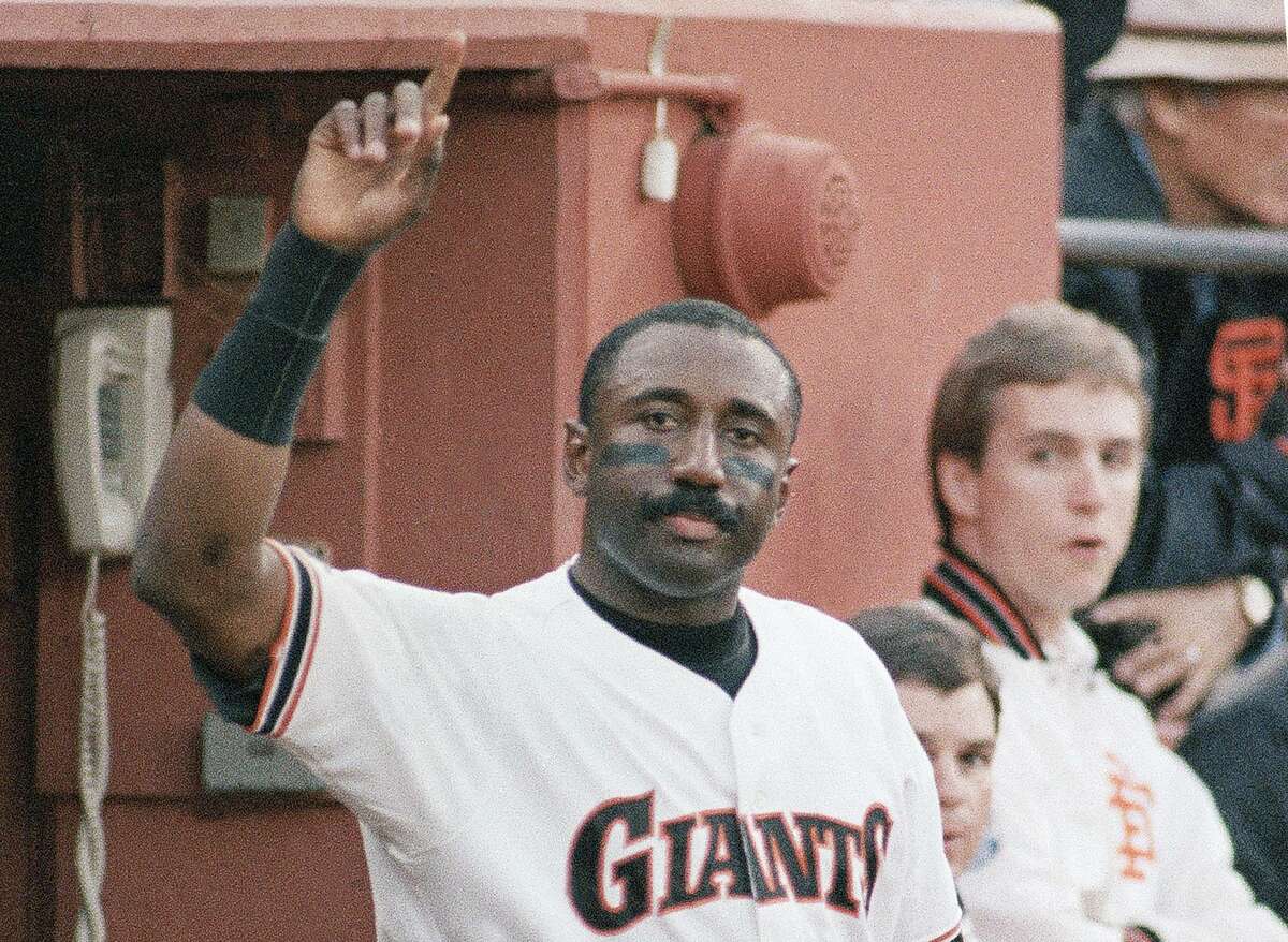 San Francisco Giants Jeffrey Leonard acknowledges the standing ovation at Candlestick Park after smashing a home run in the third inning of NLCS game against the St. Louis Cardinals, Friday, Oct. 9, 1987, San Francisco, Calif. With the solo homer, Leonard became the fourth person to hit home runs in three consecutive National League Championship Series games. (AP Photo/Lenny Ignelzi)
