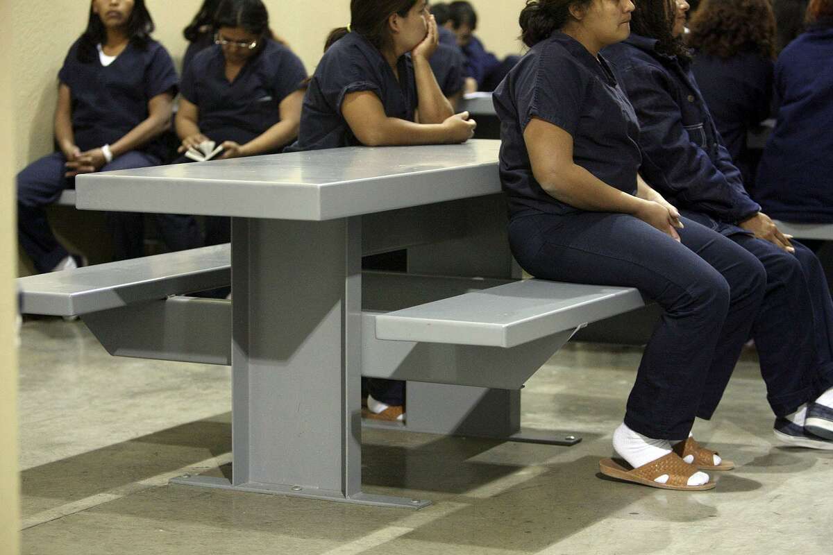 Immigrant female detainees inside their holding cell of the new Willacy County Immigration Detention Center in Raymondville, Texas Friday March 2, 2007. DELCIA LOPEZ/STAFF