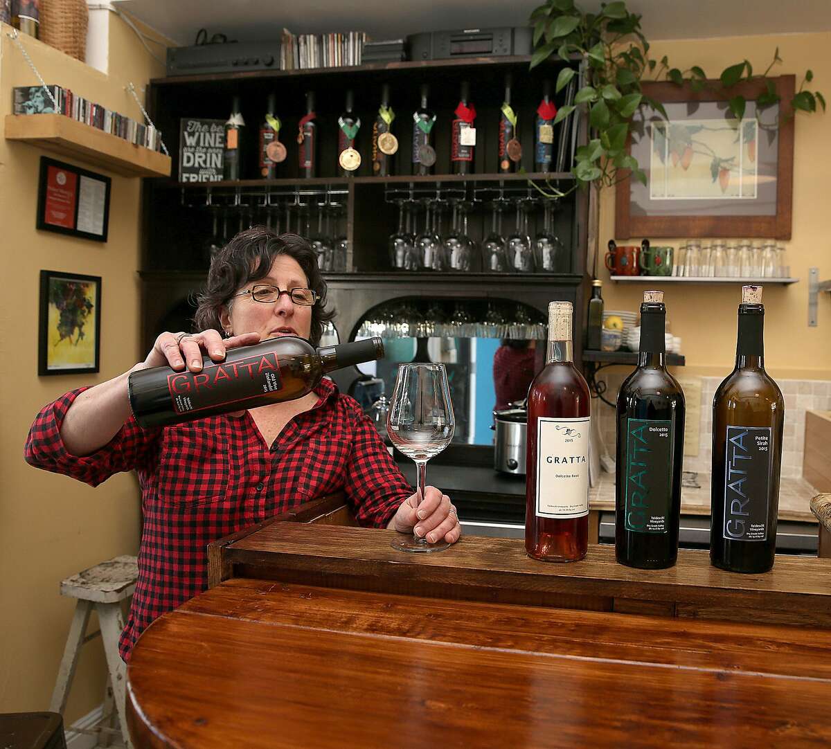 Barbara Gratta of Gratta Wines shows her tasting room at the Butchertown Gourmet Marketplace on Tuesday, March 7, 2017, in San Francisco, Calif.