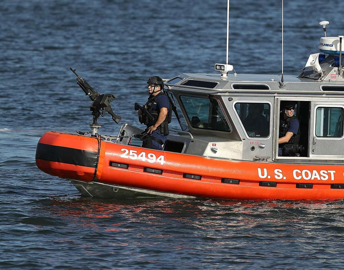 WEST PALM BEACH, FL - FEBRUARY 11: A U.S. Coast Guard boat patrols the Intracoastal Waterway near Mar-a-Lago Resort where President Donald Trump is hosting Japanese Prime Minister Shinzo Abe on February 11, 2017 in West Palm Beach, Florida. The two are scheduled to get in a game of golf as well as discuss trade issues. (Photo by Joe Raedle/Getty Images)