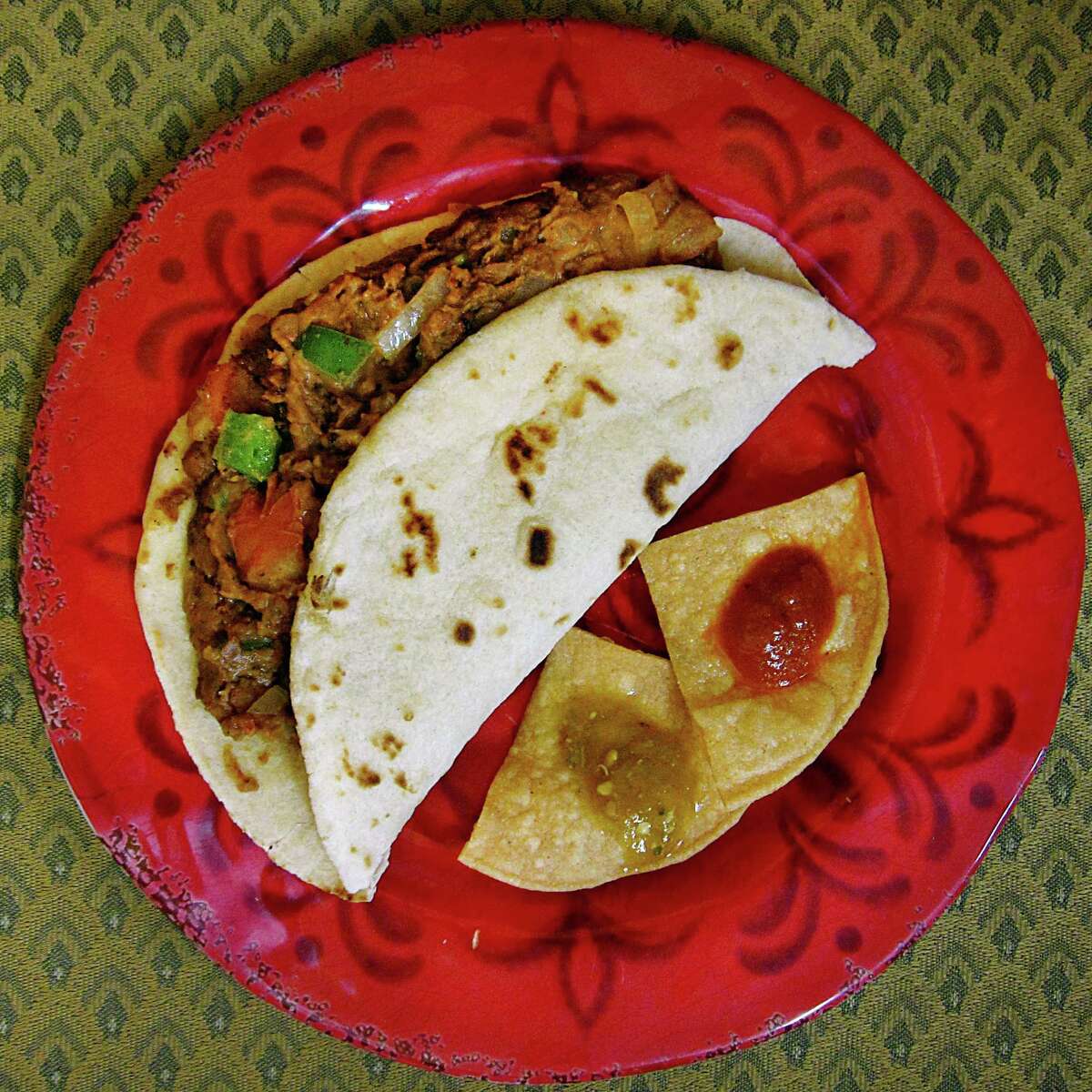 Chorizo and bean a la mexicana taco on a handmade flour tortilla from Bella's Mexican Restaurant on East Houston Street.