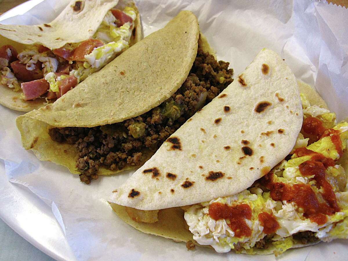 Tacos from Bella's Mexican Restaurant. From left: Country and egg on flour, picadillo on corn and potato and egg on flour.