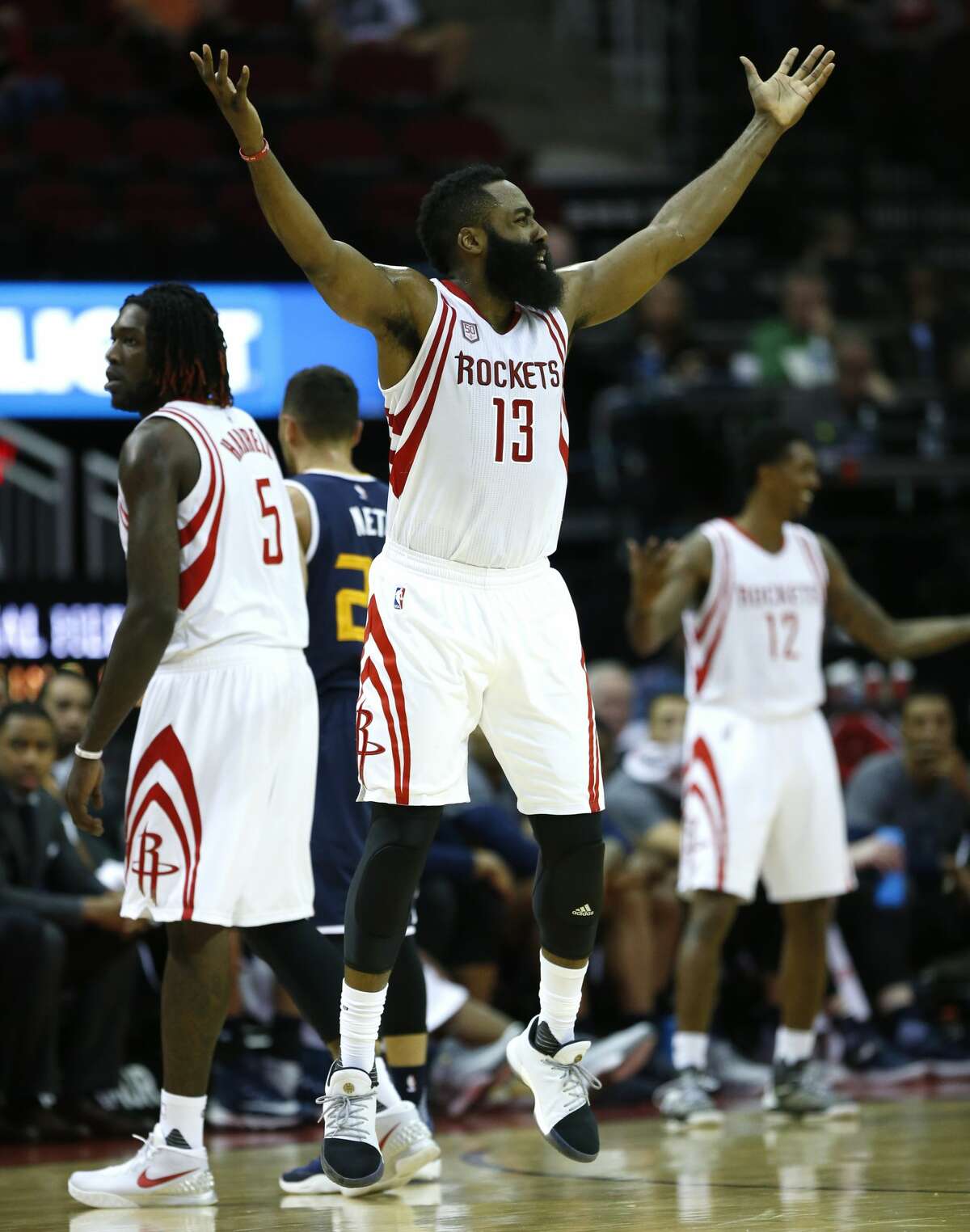 Houston Rockets guard James Harden (13) reacts after a no call following a collision with Utah Jazz guard Raul Neto during the first half of an NBA basketball game at Toyota Center on Wednesday, March 8, 2017, in Houston. ( Brett Coomer / Houston Chronicle )