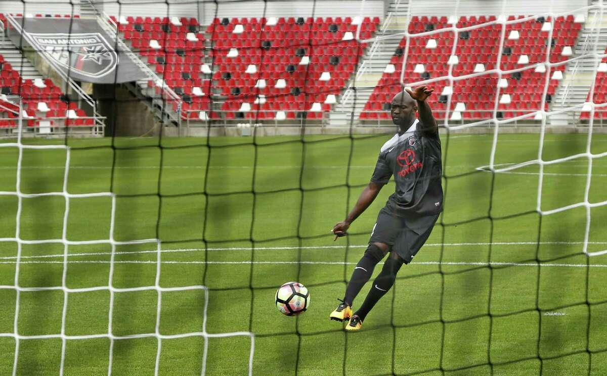 San Antonio FC player Cyprian Hedrick shoots a goal for photographers during the team’s media day event on March 8, 2017 at Toyota Field.