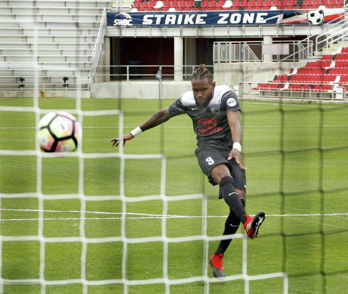 San Antonio FC player Sebastien Ibeagha takes a shot on goal during the team’s media day event on March 8, 2017, at Toyota Field.