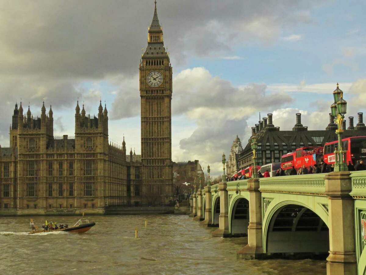 With Big Ben in the background and visitors and double-decker buses crowding the Westminster Bridge, a boat cruises down the River Thames, which provides a bounty of angling opportunities.