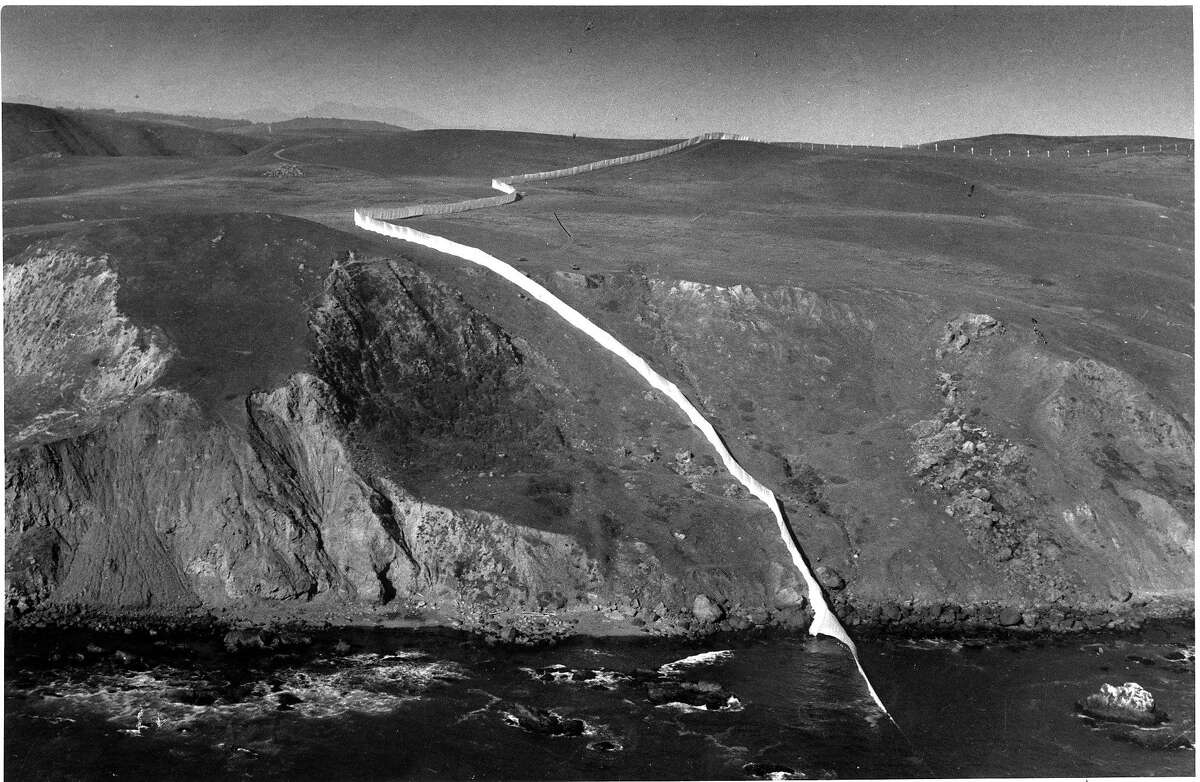 Part of New York artist Christo Javacheff's 24 mile long Running Fence, shown here dropping into the Pacific Ocean September 3, 1976 Photo ran September 4, 1976