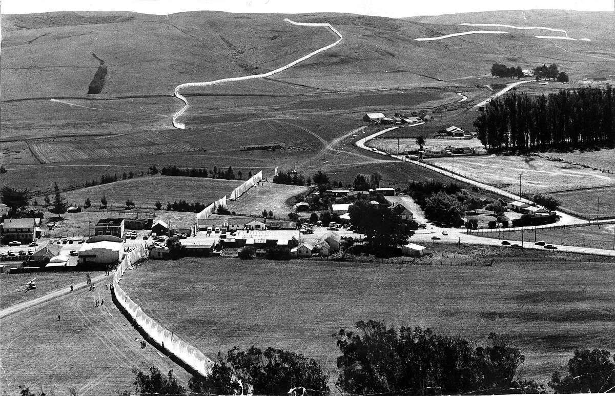 Part of New York artist Christo Javacheff's 24 mile long Running Fence, shown here dropping into the Pacific Ocean September 8, 1976 Photo ran September 9, 1976, P. 1