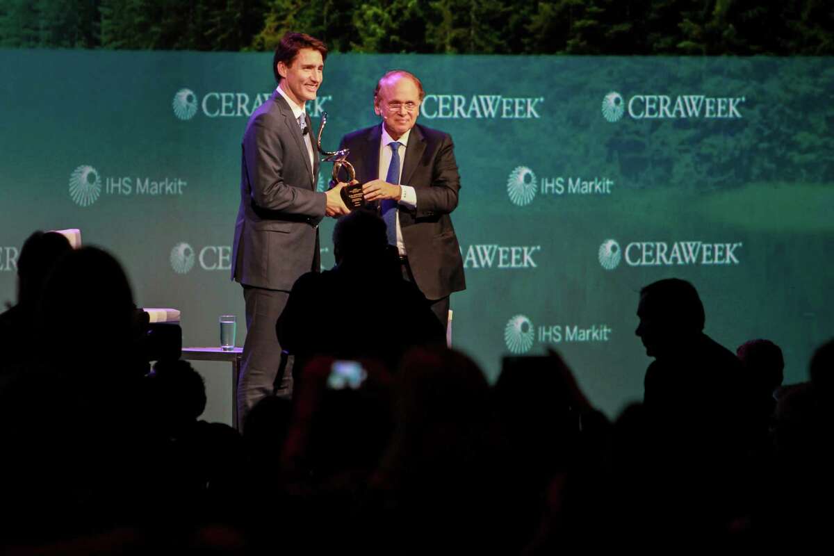 The Prime Minister of Canada, Justin Trudeau, left, receiving the CERAWeek Global Energy and Environment Leadership Award in recognition of his commitment to sustainability in energy and the environment. Presenting the award is Daniel Yergin, right, vice chairman of IHS Markit. (For the Chronicle/Gary Fountain, March 9, 2017)