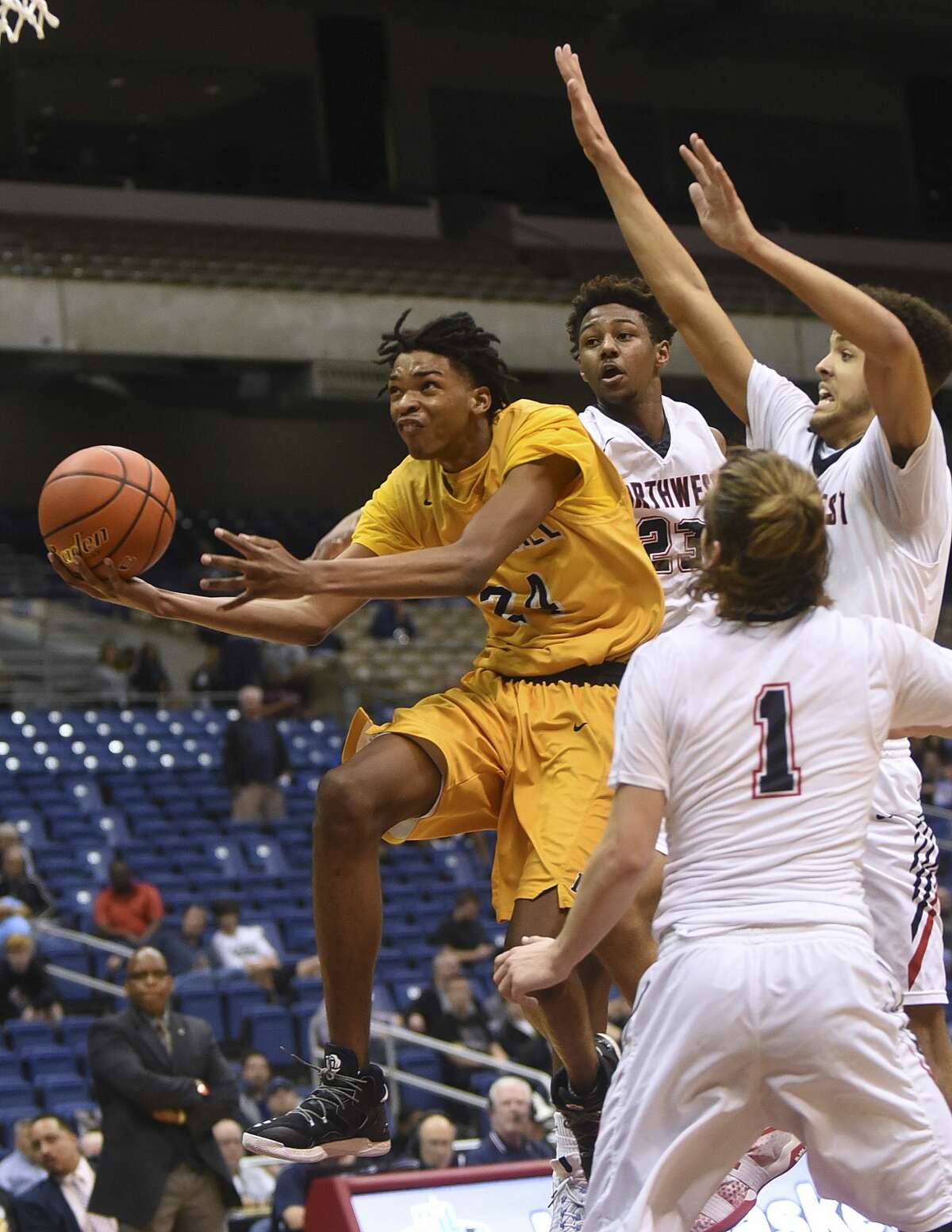 John Walker III of Fort Bend Marshall penetrates the Northwest defense during second-half Class 5A state semifinals action in the Alamodome on Thursday, March 9, 2017.