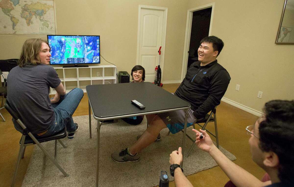 Texas A&M eSports team review and evaluate a video recording of a game the team played earlier that week to strategize for their next playoff matchup Saturday, March 4, 2017, in College Station. Clockwise: Zac Acosta, Andrew Oh, Youssef Elmasry and Joey Bowers. ( Yi-Chin Lee / Houston Chronicle )