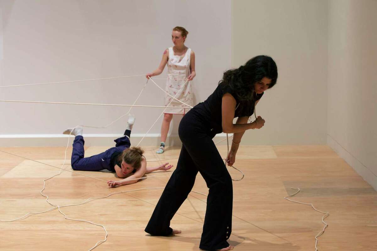 Rope Dance, 2015. Concept, title and score by Anna Halprin. Interpretations and variations by Janine Antoni, foreground, and Stephen Petronio. Commissioned by The Fabric Workshop and Museum, Philadelphia. Rope Dance performance part of Entangle at the Tang Teaching Museum at Skidmore College. Photograph by Arthur Evans.