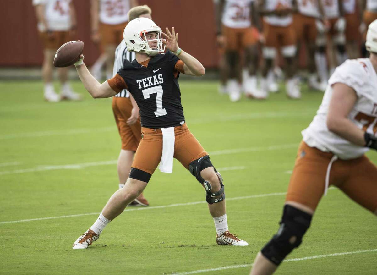 Quarterback Shane Buechele throws during a passing drill at the Longhorns’ spring practice on Tuesday, March 7, 2017.