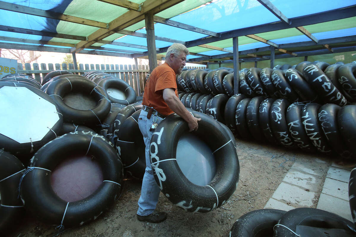 J. Felger arranges tubes at his business near Prince Solms Park in New Braunfels, Texas. Felger has been in business for 42 years and said he's not too optimistic about being open this weekend because of the weather forecast.