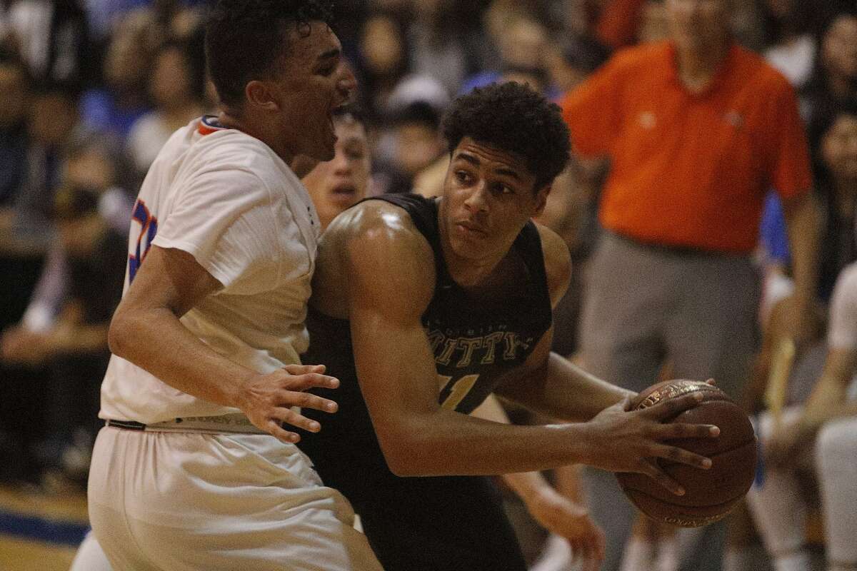 Isaiah Mellor of St. Joseph defends against Mitty's Riley Grigsby in the first-round boys basketball game in the NorCal Open Division. Mitty (17-10) and St. Joseph (30-1). on Friday, March 10, 2017 in Alameda, CA.During the first-round boys basketball game in the NorCal Open Division. Mitty (17-10) and St. Joseph (30-1). on Friday, March 10, 2017 in Alameda, CA.