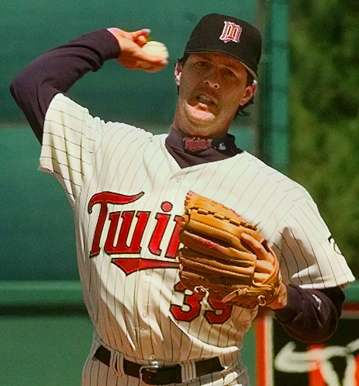 Minnesota Twins pitcher Bob Tewksbury throws against the Texas Rangers Thursday, March12, 1998, in Fort Myers, Fla. Tewksbury allowed three hits in five innings. (AP Photo/Bill Sikes)
