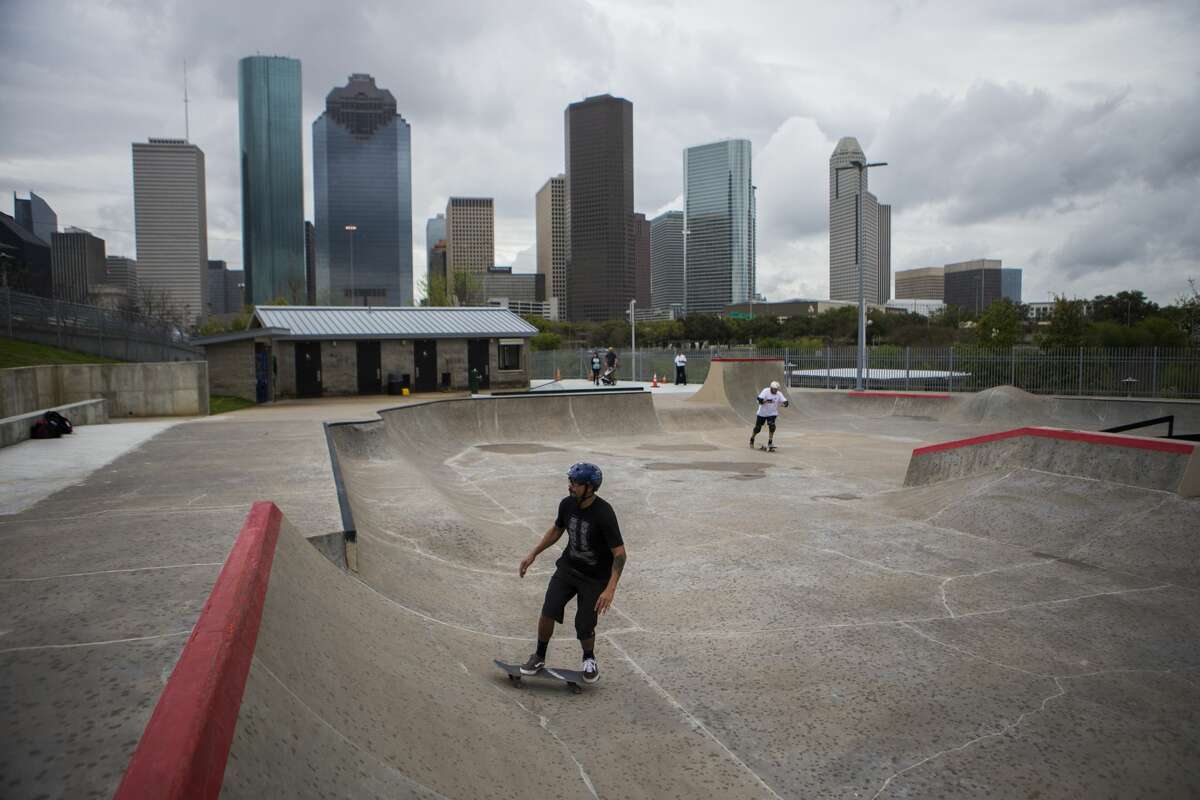 Antonio Saenz, 44, practices at the renovated Lee & Joe Jamail Skatepark during the reopening day, Saturday, March 11, 2017, located at 103 Sabine Street in Houston. The upgrades includes terraced seating, LED light poles and refinishing the concrete for surface that is smooth and even. ( Marie D. De Jesus / Houston Chronicle )