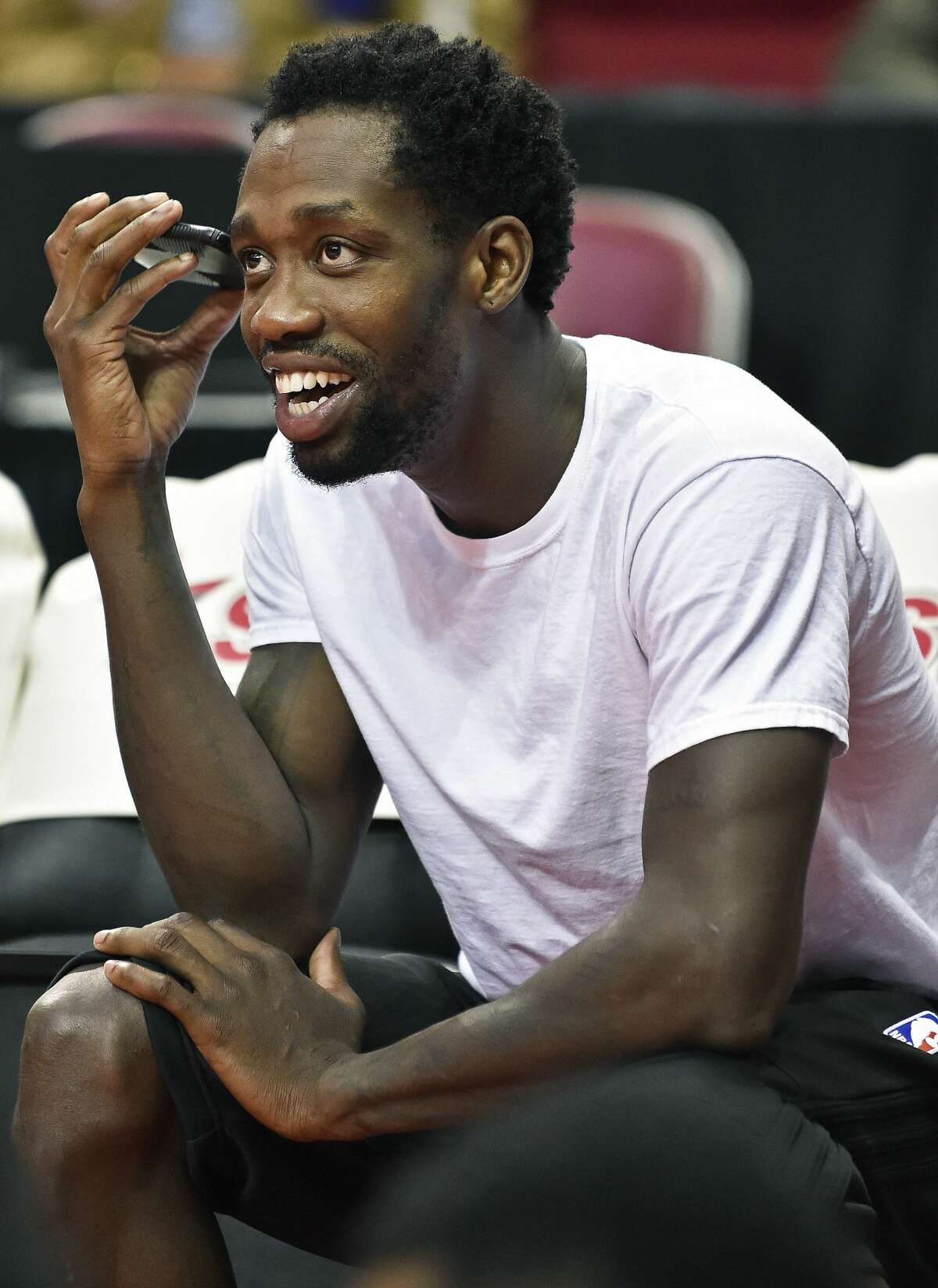 Houston Rockets' Patrick Beverley watches from the sidelines during the first half of an NCAA college basketball game between Texas Southern and Grambling in the championship of the Southwestern Athletic Conference, Saturday, March 11, 2017, in Houston. (AP Photo/Eric Christian Smith)