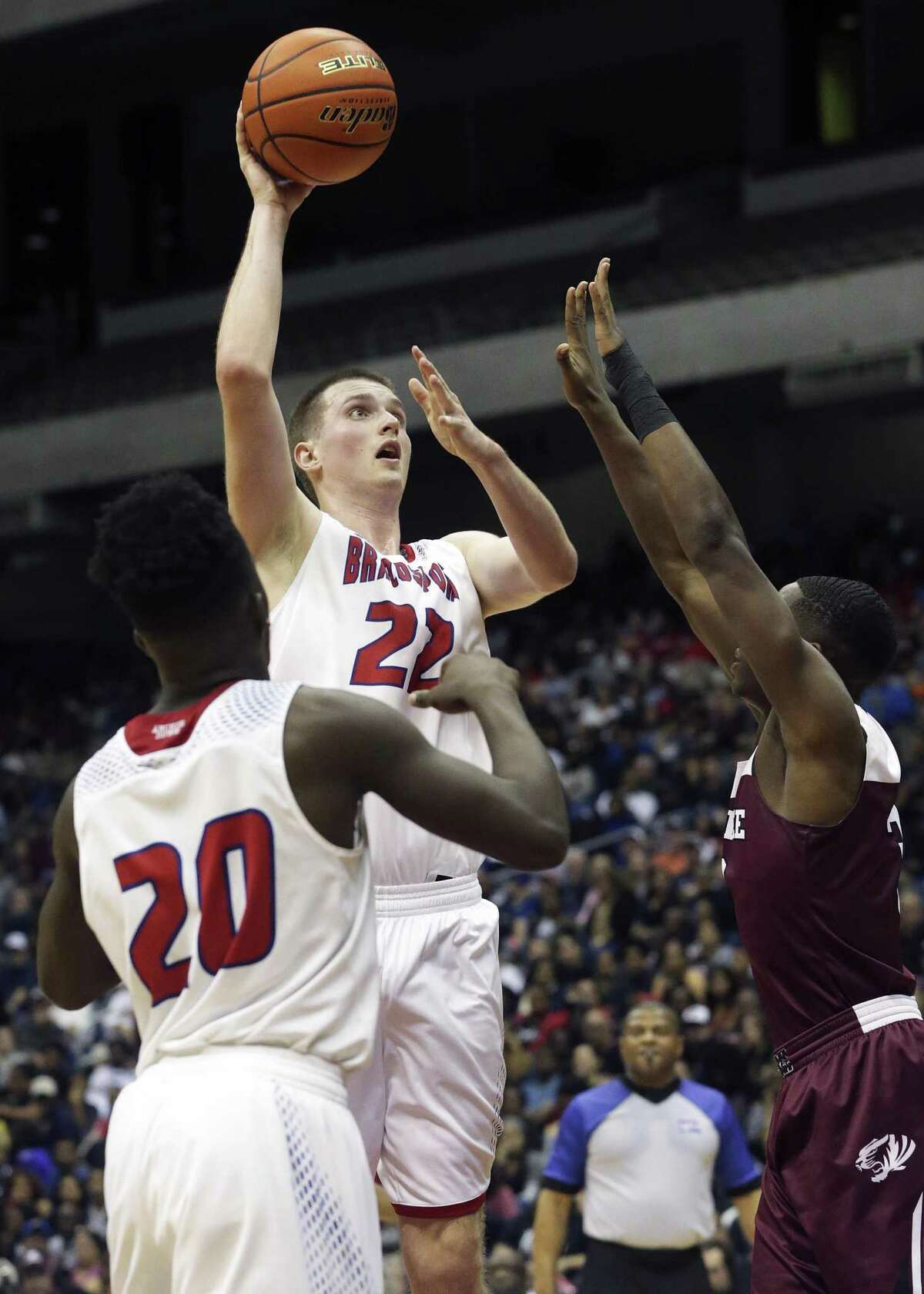 Hunter Quick puts up a jumper in the lane in the second half as his Brazosport Exporters fight to stay in the game against Silsbee in the state championship basketball game for class 4A boys at the Alamodome on March 11, 2017.