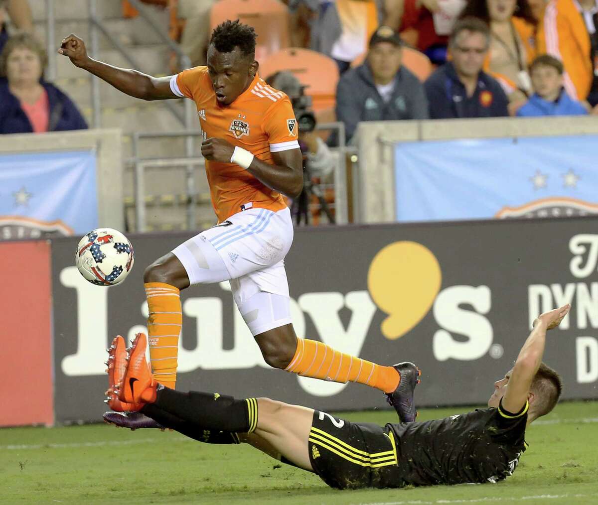 Dynamo forward Alberth Elis, left, attempts to dodge Columbus defender Jukka Raitala during the first half Saturday at BBVA Compass Stadium﻿. Elis scored the Dynamo's second goal in the 35th minute.