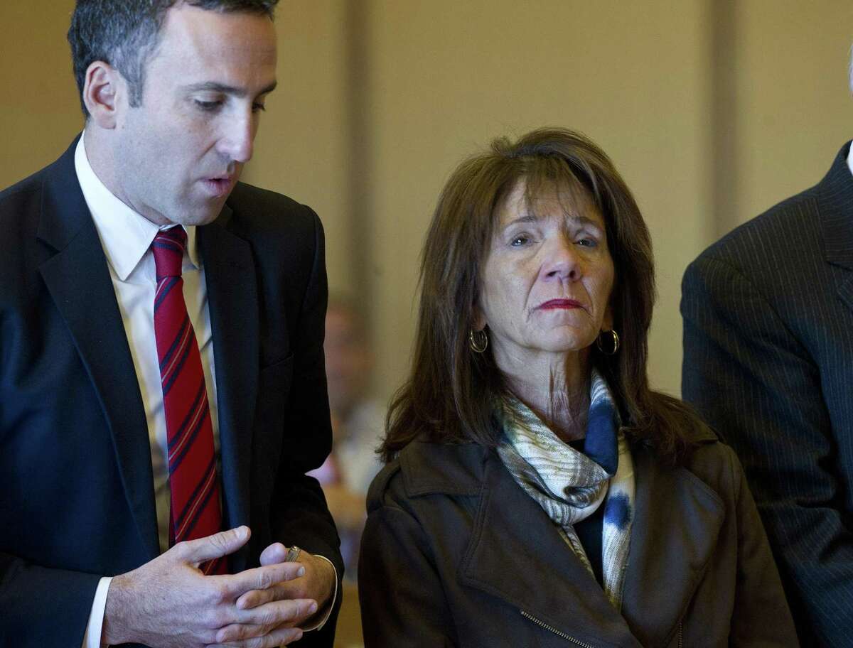 Former Stamford High Principal Donna Valentine, and one of her attorneys, Mark Sherman, attend a court hearing in 2014.