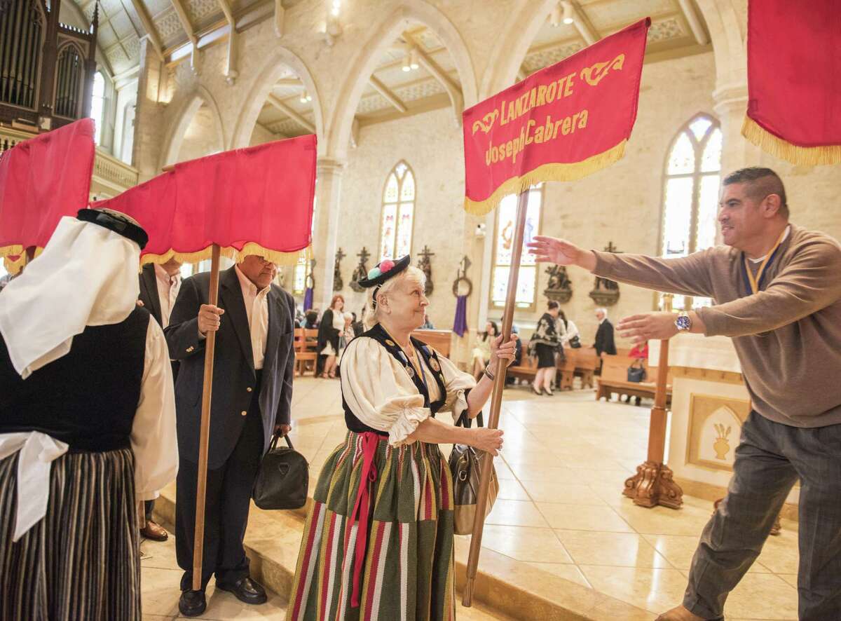 Alicia Calderon, a member of Canary Islands Descendants Association, commemorates the arrival of their ancestors in San Antonio on March 12, at San Fernando Cathedral. Some members of the association dressed in full historical attire and carried banners representing the original 16 families who established the first civil government in San Antonio.