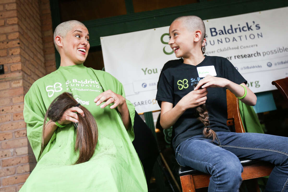 Heads get shaved during St. Baldrick's celebration
