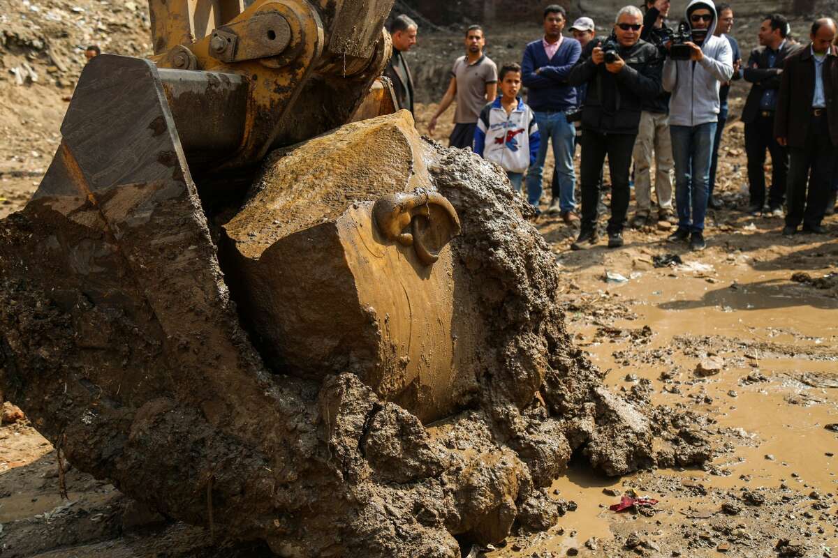 CAIRO, EGYPT - MARCH 8: A quartzite colossus possibly of Ramses II and limestone bust of Seti II are seen after they were discovered at the ancient Heliopolis archaeological site in Matareya area in Cairo, Egypt on March 9, 2017. The statues were found in parts in the vicinity of the King Ramses II temple in the temple precinct of ancient Heliopolis, also known as Oun, by a German-Egyptian archaeological mission. (Photo by Ibrahim Ramadan/Anadolu Agency/Getty Images)