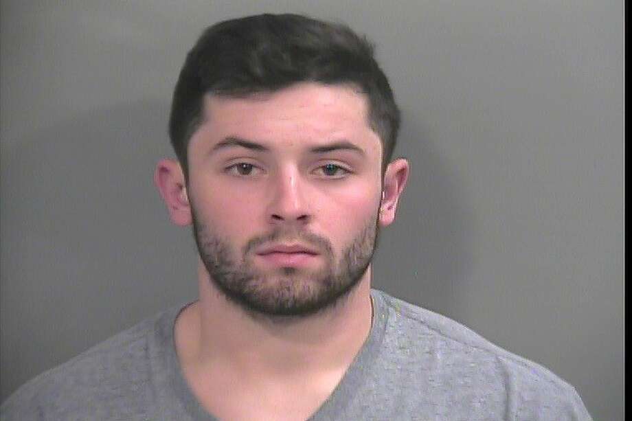 Watch Ou Quarterback Baker Mayfield Tackled By Police During Arrest Houston Chronicle