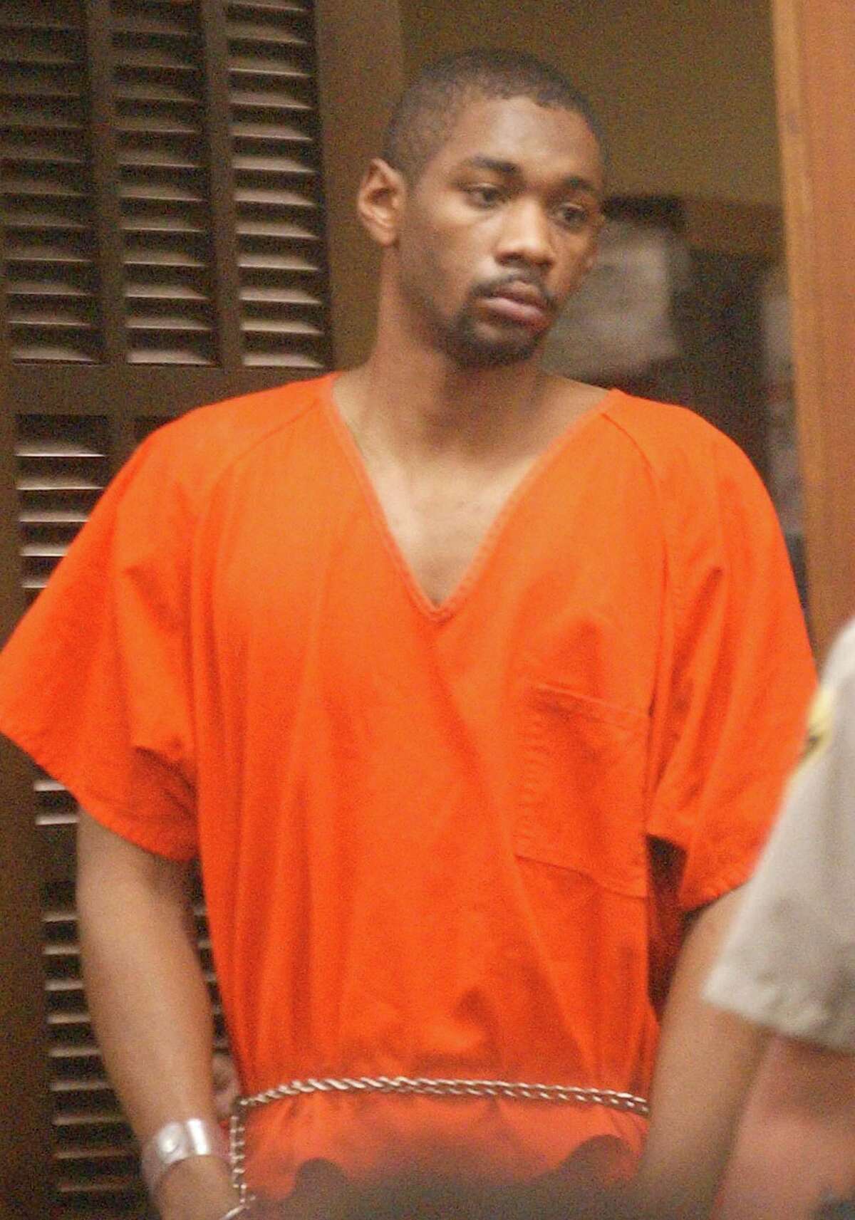 Former Baylor basketball player Carlton Dotson appears in 54th District Court for his arraignment on Oct. 29, 2003, in Waco on charges in the shooting death of former teammate Patrick Dennehy.