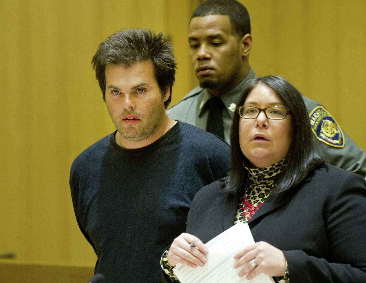Timothy Anderson, 42, stands with attorney April Pramer as he is arraigned in State Superior Court in Stamford, Conn., on Tuesday, March 24, 2015, on charges of unlawful restraint, disorderly conduct and two charges of assault for beating his mother. He was later charged with murder after his mother died, police say.