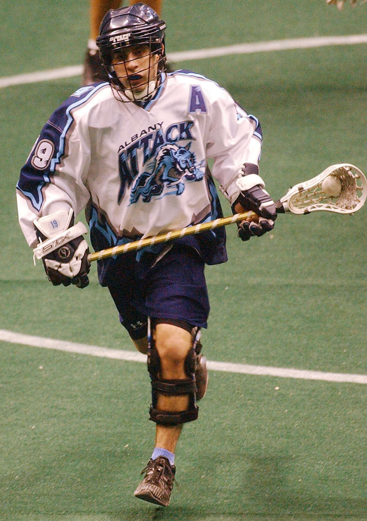The old Albany Attack jersey, one of which was worn by Josh Sanderson (above) in 2002, is the prize given to the Albany FireWolves Player of the Game after a victory. The FireWolves use one that belonged to former Attack defenseman Darryl Gibson, now a FireWolves assistant.