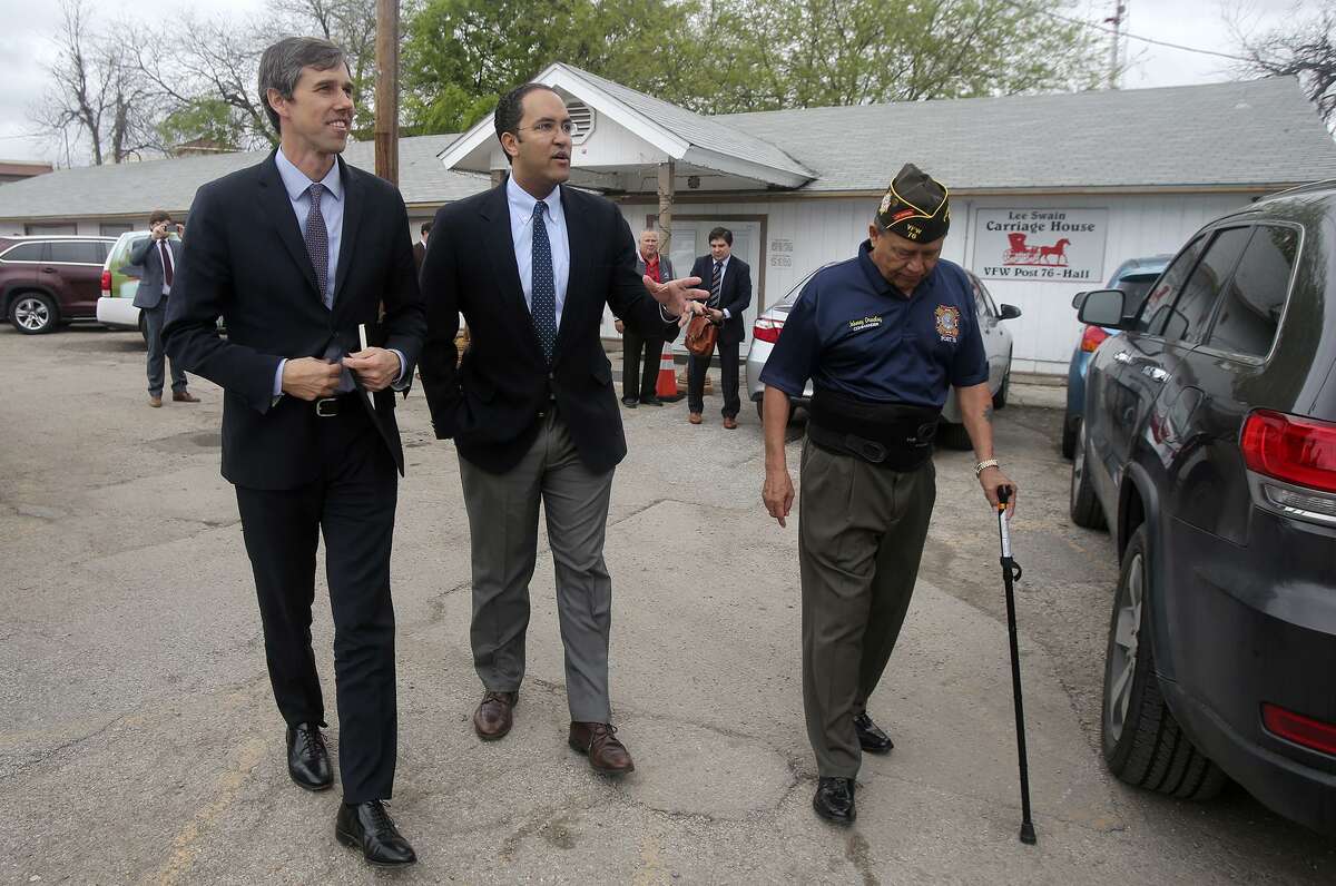 O’Rourke (from left) and Hurd walk with Johnny Ornelaz, post commander at VFW Hall 76. Both spoke with veterans about issues they face.