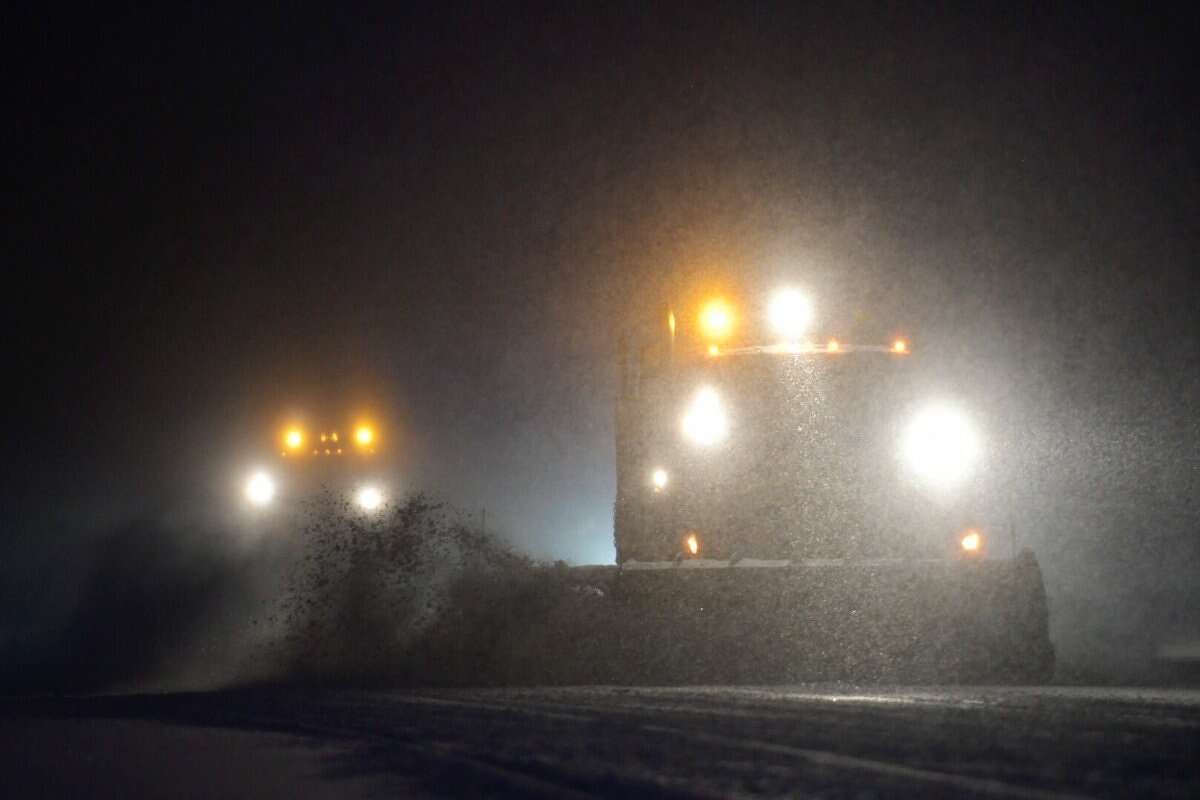 Snow plows were out early on Route 9 in Colonie on Tuesday clearing the first inches of what could be two feet of snow dropped by a storm that forecasters say could become a blizzard. (Skip Dickstein / Times Union)