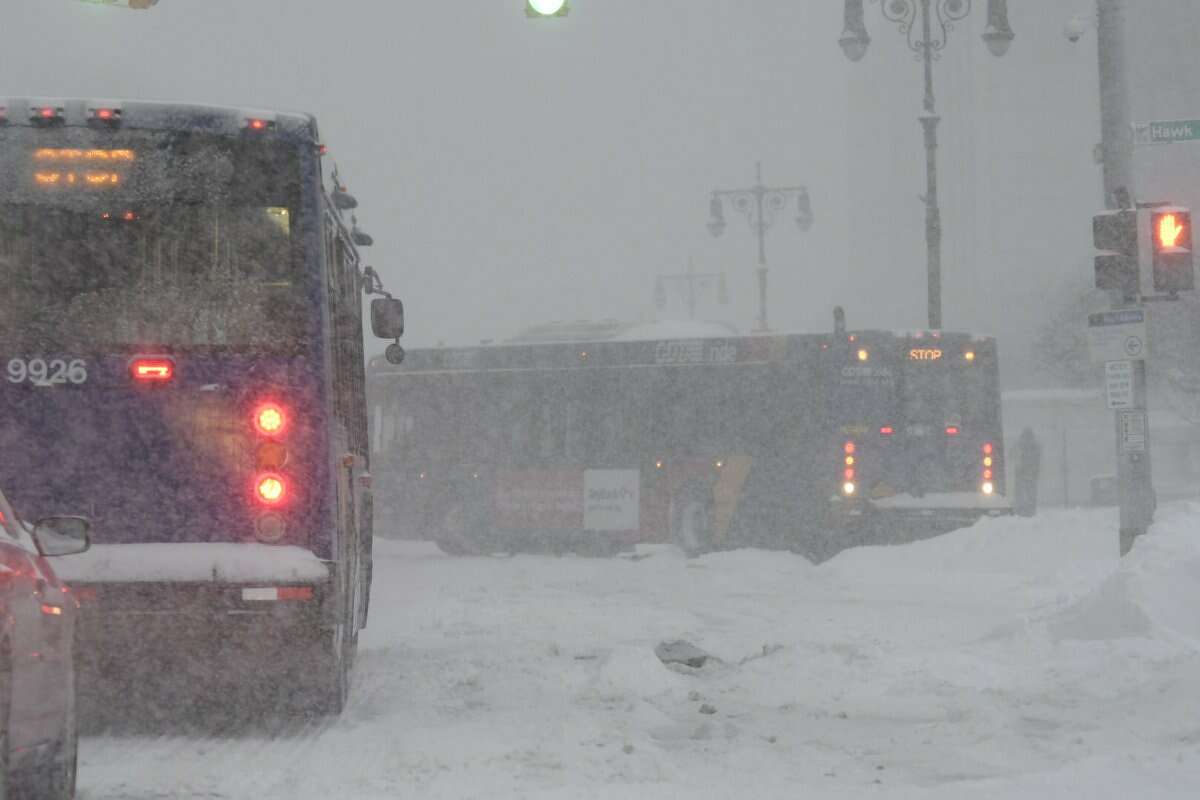 A Capital District Transportation Authority bus has a tough time with Washington Avenue in Albany during the snow storm Tuesday morning. (Skip Dickstein / Times Union)