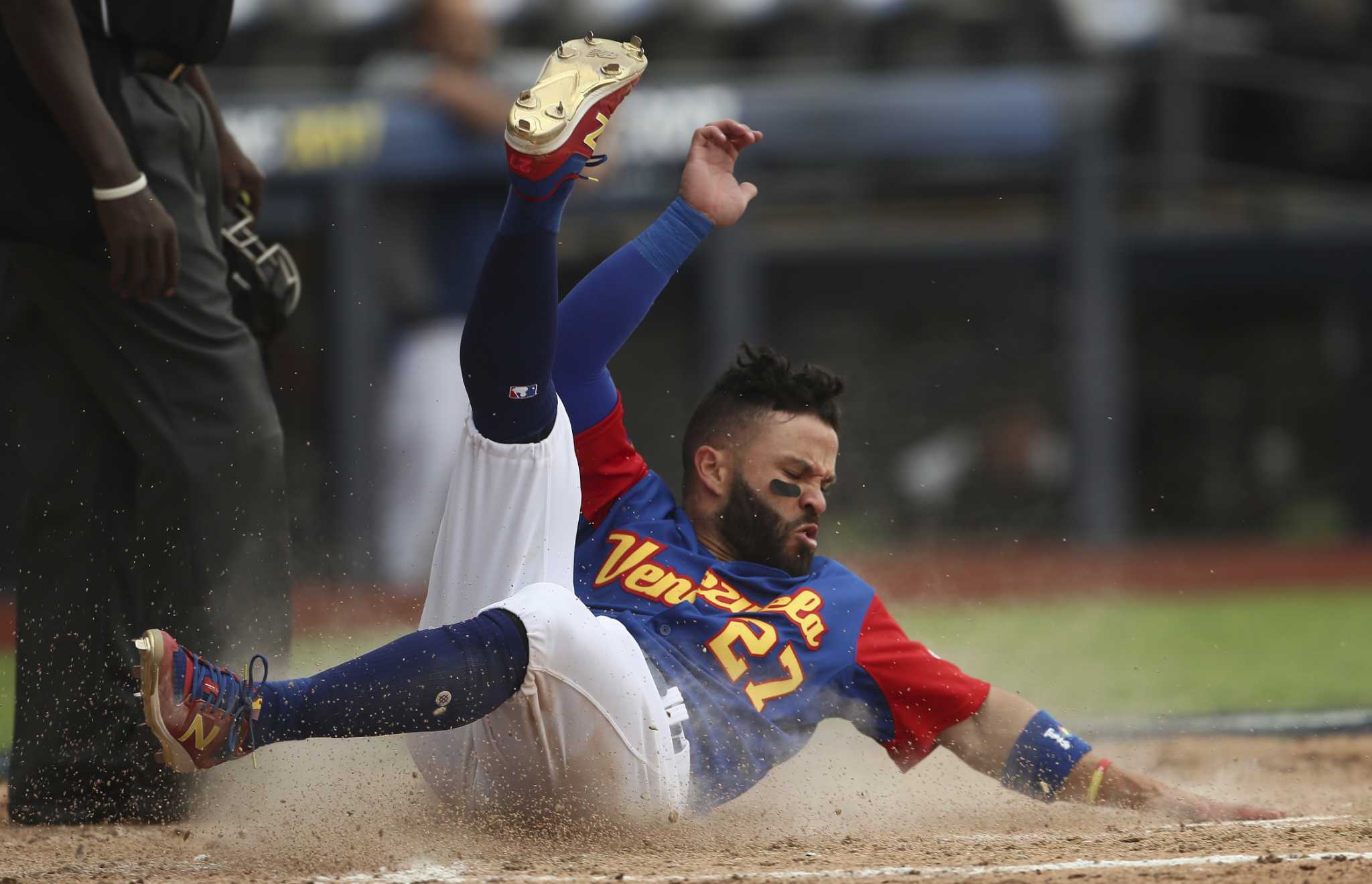 Texas Rangers Rougned Odor flips his bat as he watches his home run during  the sixth inning of the team's baseball game against the Houston Astros on  Friday, July 19, 2019, in