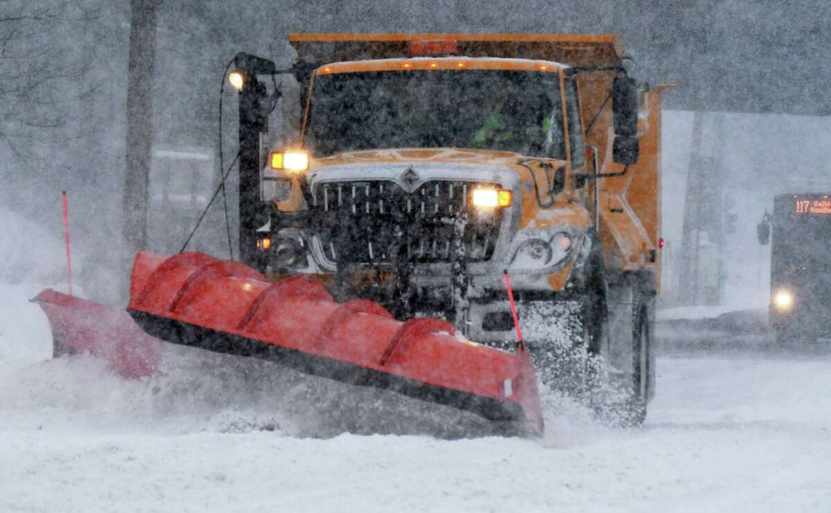 A Town of Colonie snow plow clears a lane on Albany Shaker Road as winter storm Stella @NWS #StellaBlizzard hits the Capital Region Tuesday March 14, 2017 in Colonie, NY. (John Carl D'Annibale / Times Union)