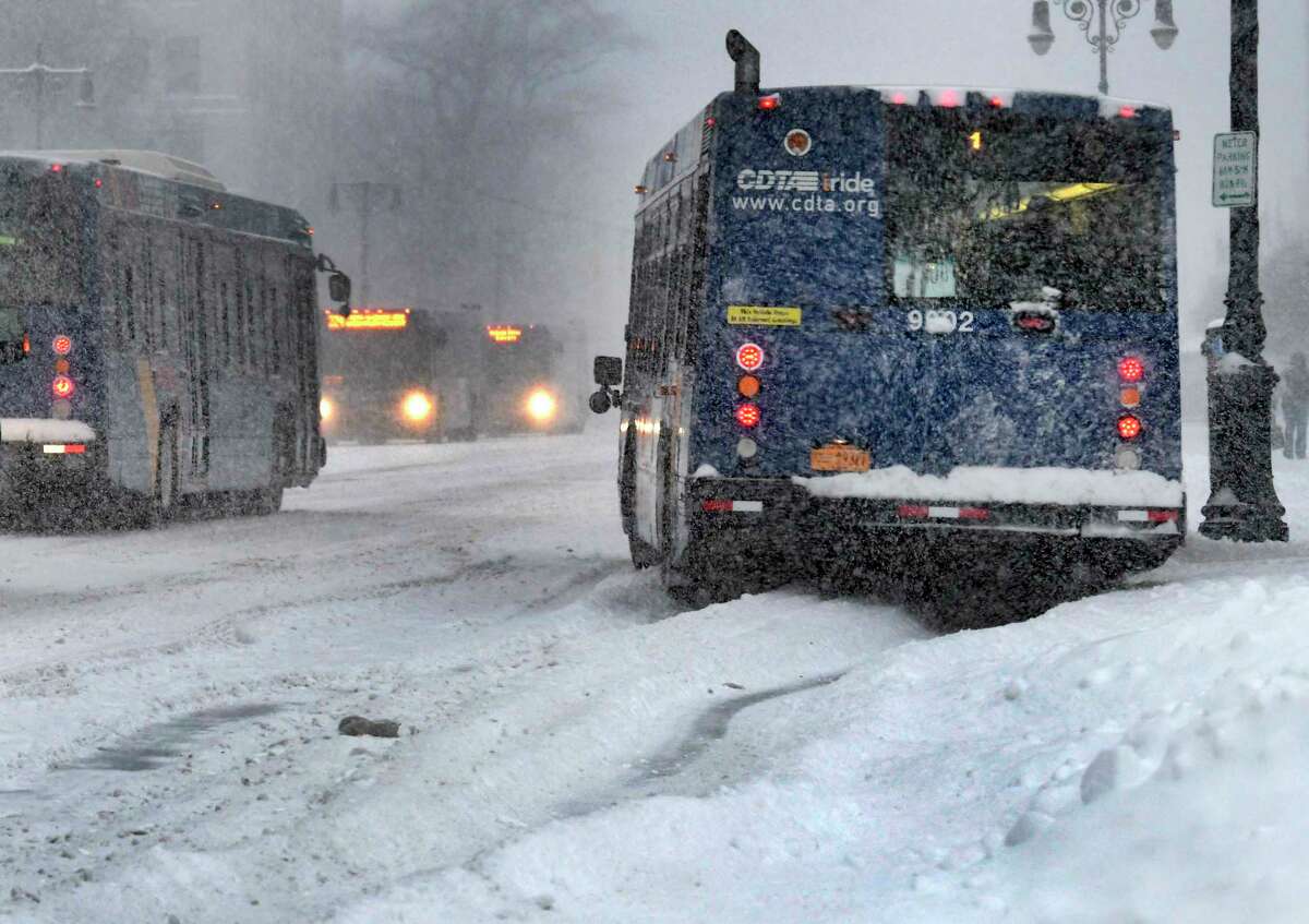 A CDTA bus slides sideways on Washington Avenue near the State Capitol due to the heavy snow from a winter snowstorm on Tuesday, March 14, 2017, in Albany, N.Y. (Skip Dickstein/Times Union)