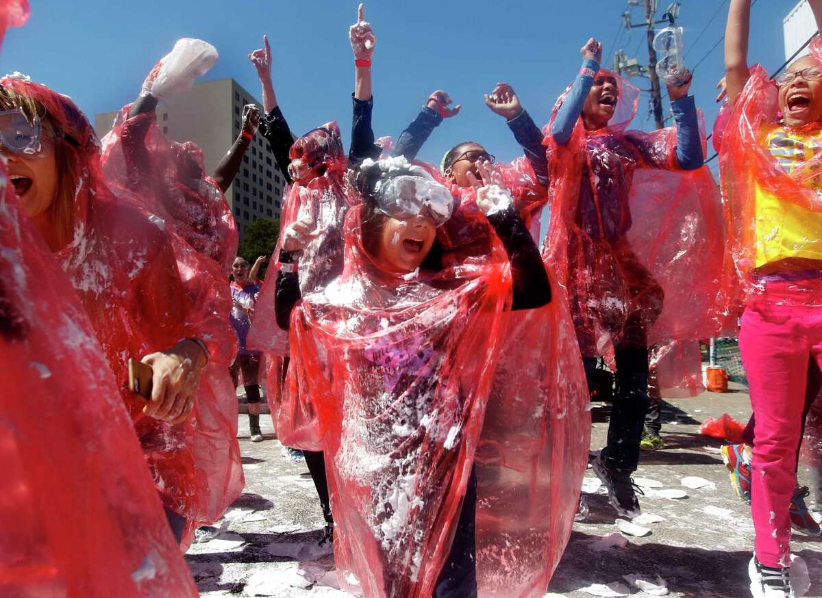 Children enjoy 8th Annual Pi Day pie fight