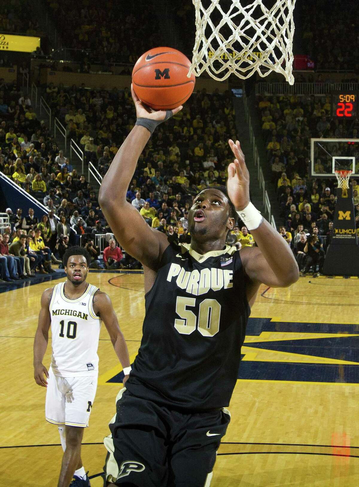 PURDUE: forward Caleb Swanigan (50) goes to the basket uncontested in the second half of an NCAA college basketball game against Michigan at Crisler Center in Ann Arbor, Mich., Saturday, Feb. 25, 2017. Michigan won 82-70. (AP Photo/Tony Ding)