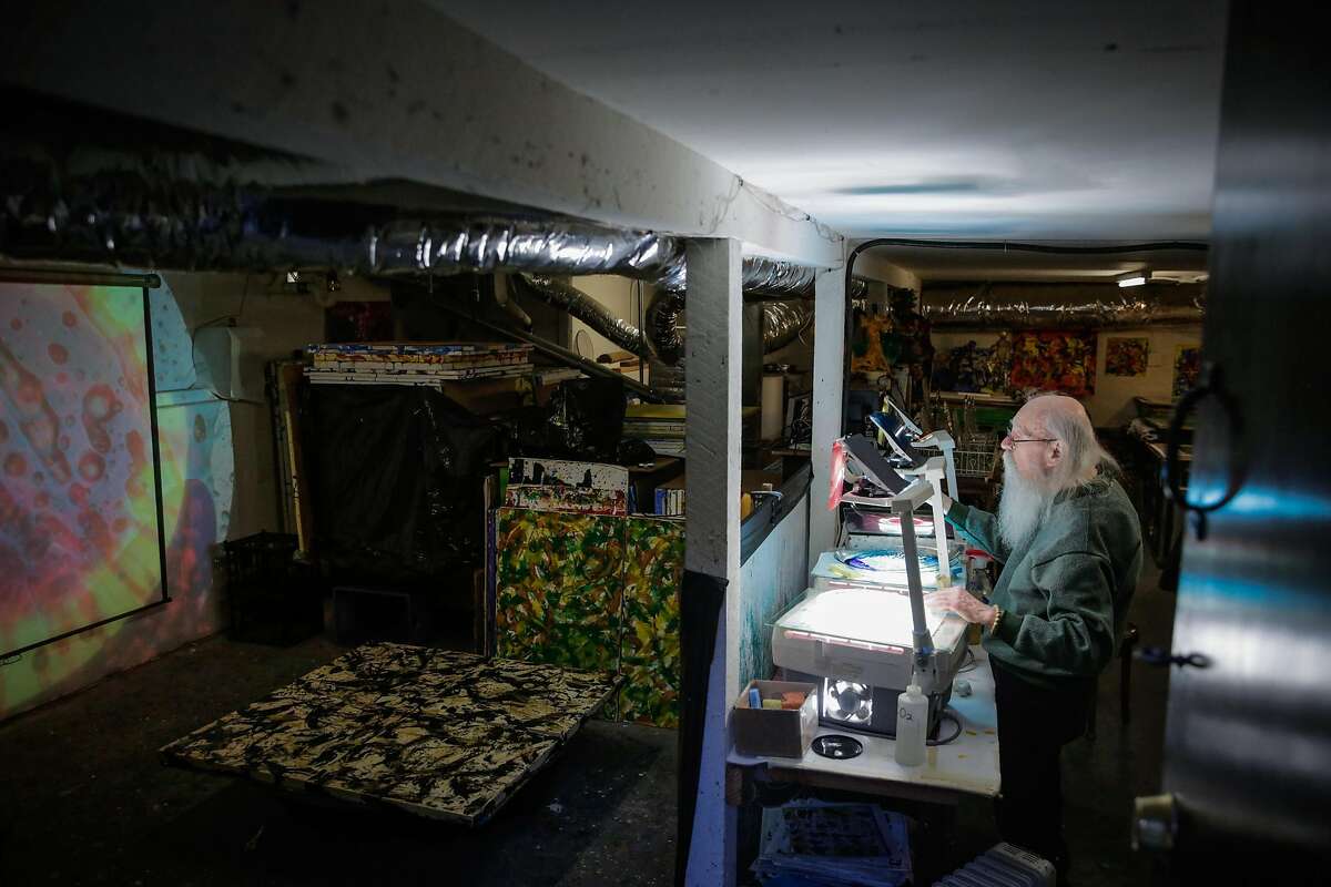 Artist Bill Ham demonstrates his light projection paintings at his studio in San Francisco.