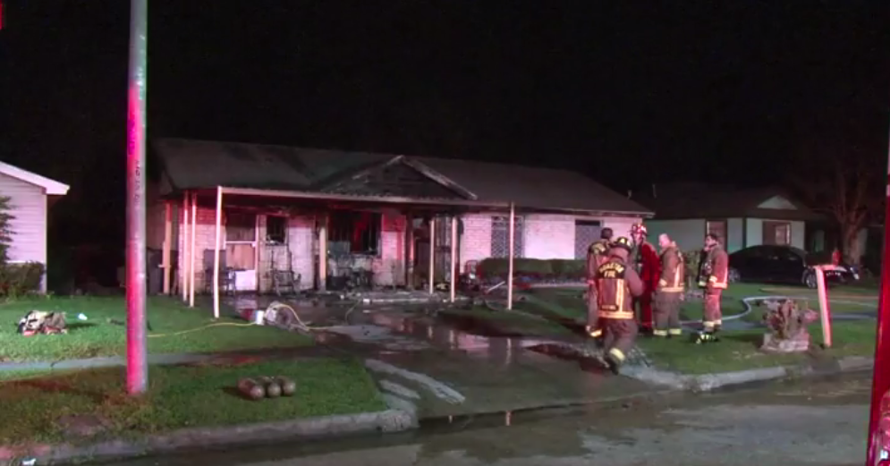 Slow burn: Houston homeowner stomps off as house goes up in flames