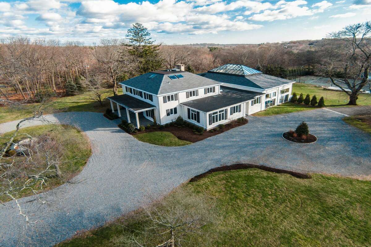 The Governors Estate,?“ at 345 Governors Lane includes the main house, newly renovated guest cottage, and its 3.8-acre property also has a championship tennis court.