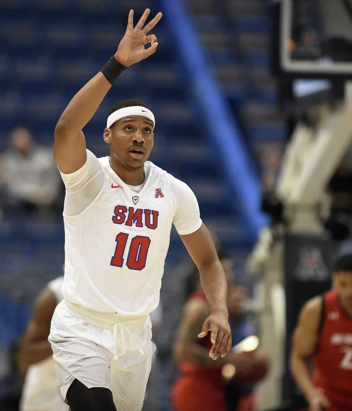 SMU guard Jarrey Foster (10) signals a 3-pointer during the second half against Cincinnati of the 2017 AAC tournament championship game on March 12, 2017, at the XL Center in Hartford, Conn.