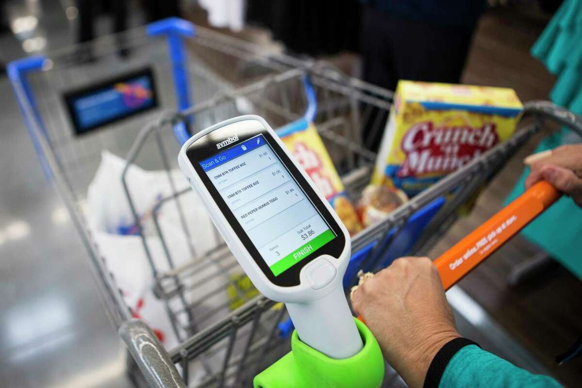 Wal-Mart's new Scan & Go technology allows customers to skip checkout lines by scanning items and paying with mobile phones or store-provided devices.﻿