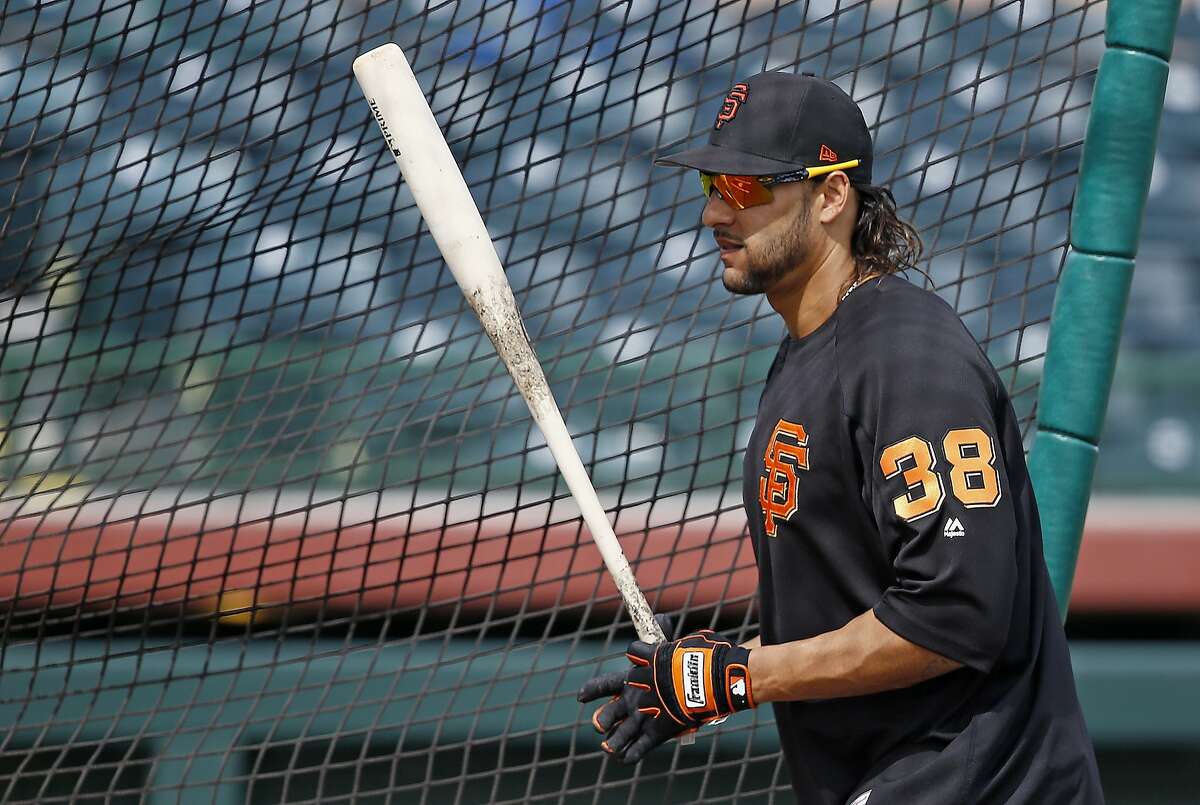 San Francisco Giants first baseman Michael Morse steps out of the batting cage during batting practice prior to a spring training baseball game against the Los Angeles Angels Wednesday, March 15, 2017, in Scottsdale, Ariz. The Giants defeated the Angels 7-4. (AP Photo/Ross D. Franklin)