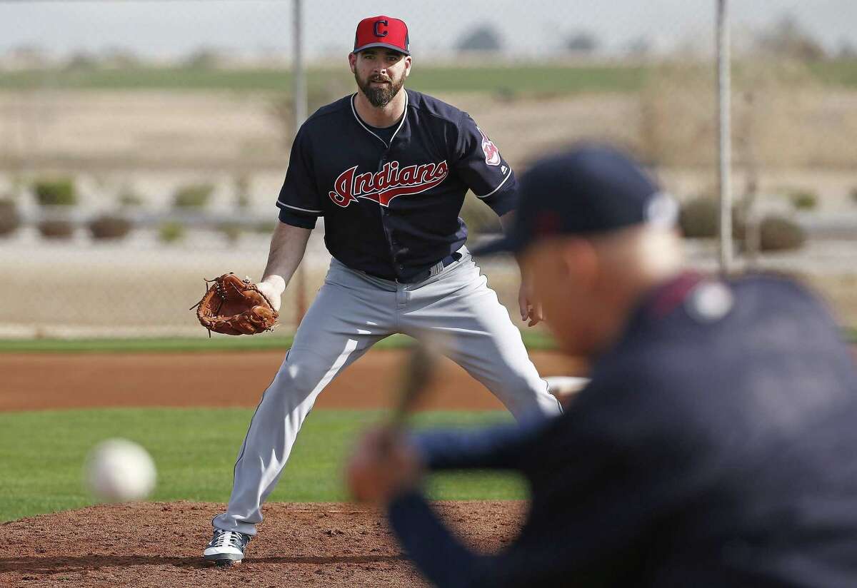 Cleveland Indians pitcher Boone Logan peforrms fielding drills at the team’s spring training facility on Feb. 14, 2017, in Goodyear, Ariz.