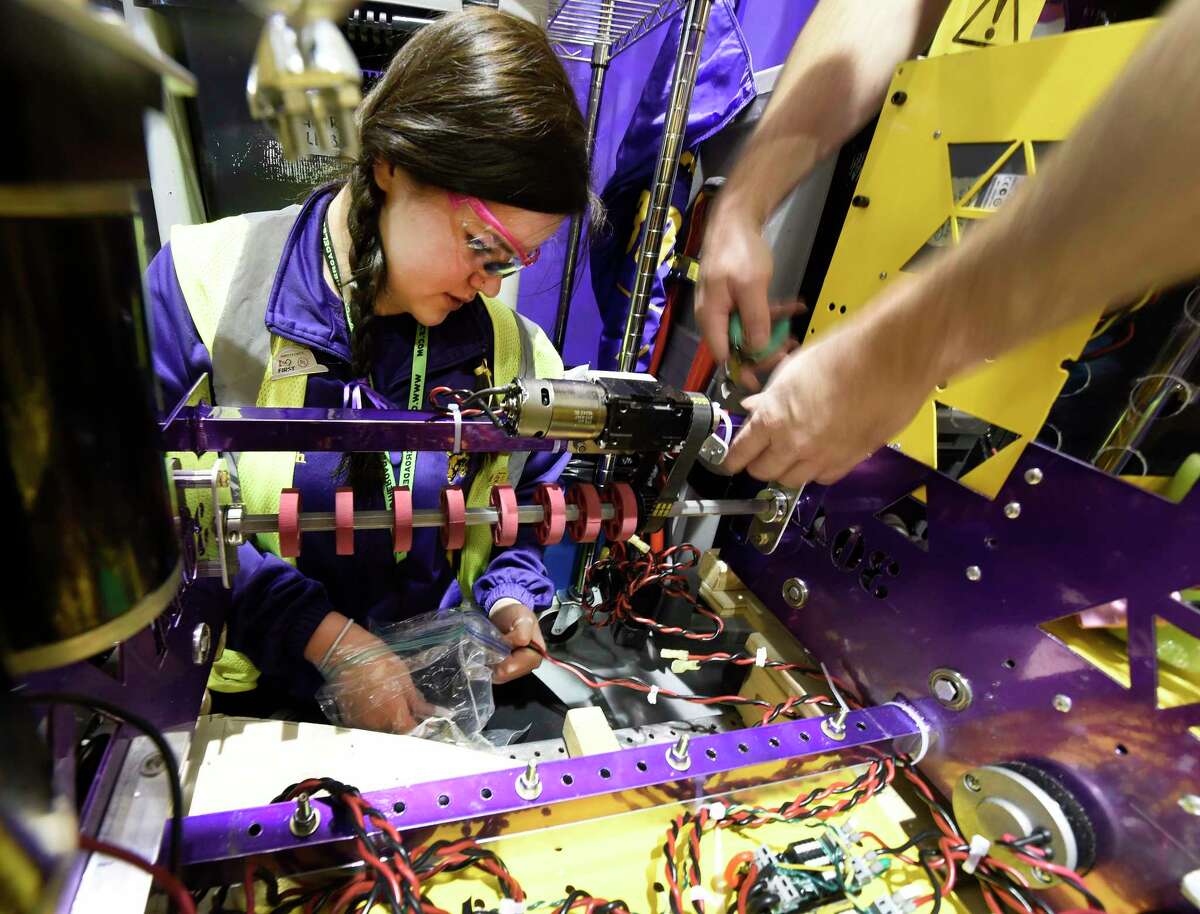Maddie Welch,17, of the Ballston Spa High School team works on her FIRST Robotics Competition robot at RPI Thursday March 16, 2017 in Troy, N.Y. The FIRST Robotics Competition combines the excitement of sports with the rigors of science and technology. The competition phase of the event begins Friday after a day of assembly and practice today and competition continues through Saturday. ( (Skip Dickstein/Times Union)