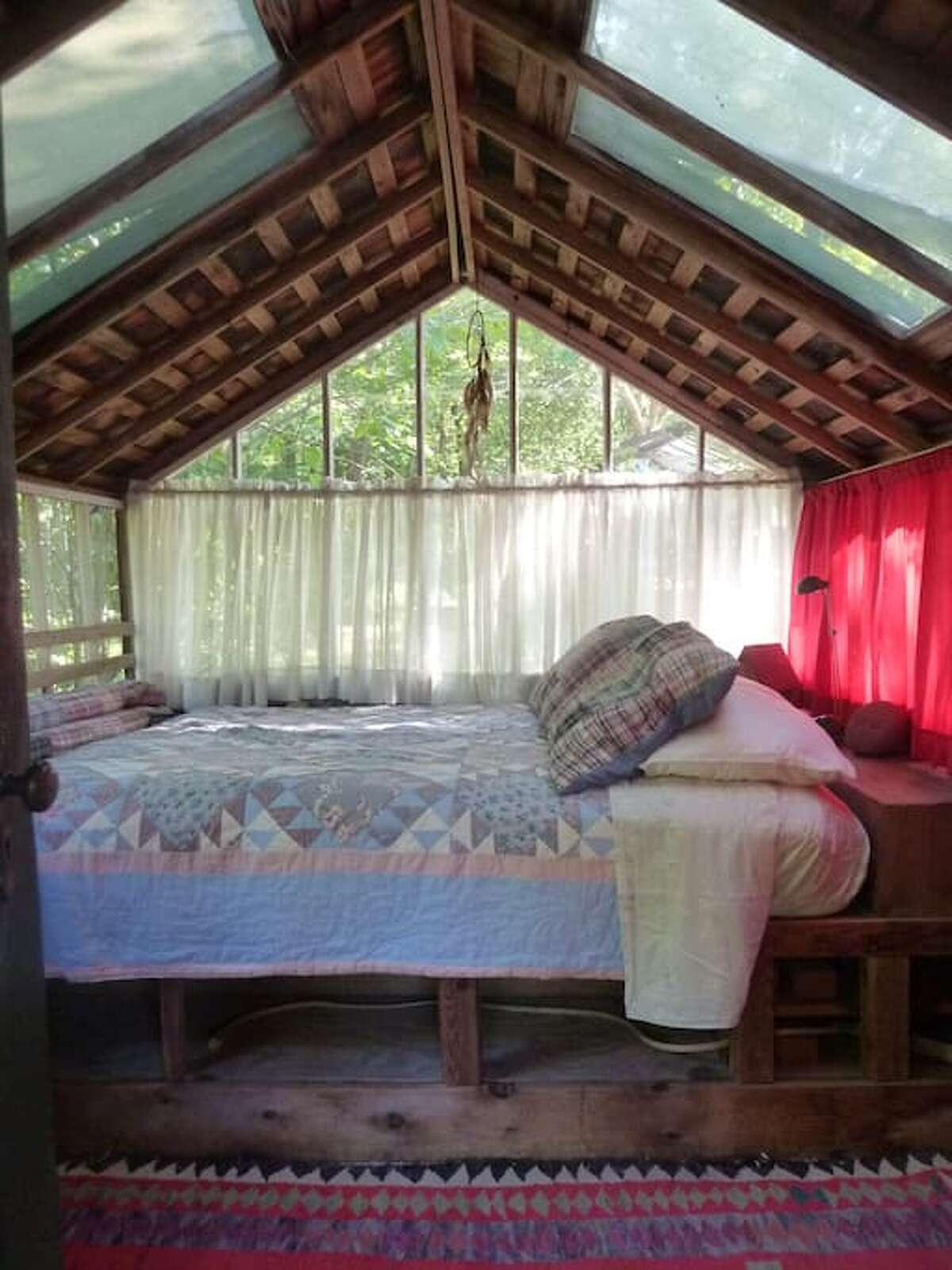 River houseboat, Newtown $99 a night Description: Our rustic River Houseboat is on the edge of the Pootatuck River on our lower pond. The Houseboat has a comfy queen bed and a screened porch complete with two antique rocking chairs. The River Houseboat is often preferred because it is located close to the main Stone Barn and parking lot. The Stone Barn is open 24 hours and has a hot shower, toilet, and common room with internet and books. View full listing on Airbnb